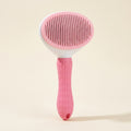 Brosse autonettoyante pour chien et chat, coloris rose