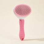 Brosse autonettoyante pour chien et chat, coloris rose