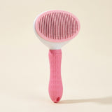Brosse autonettoyante pour chien et chat, coloris rose